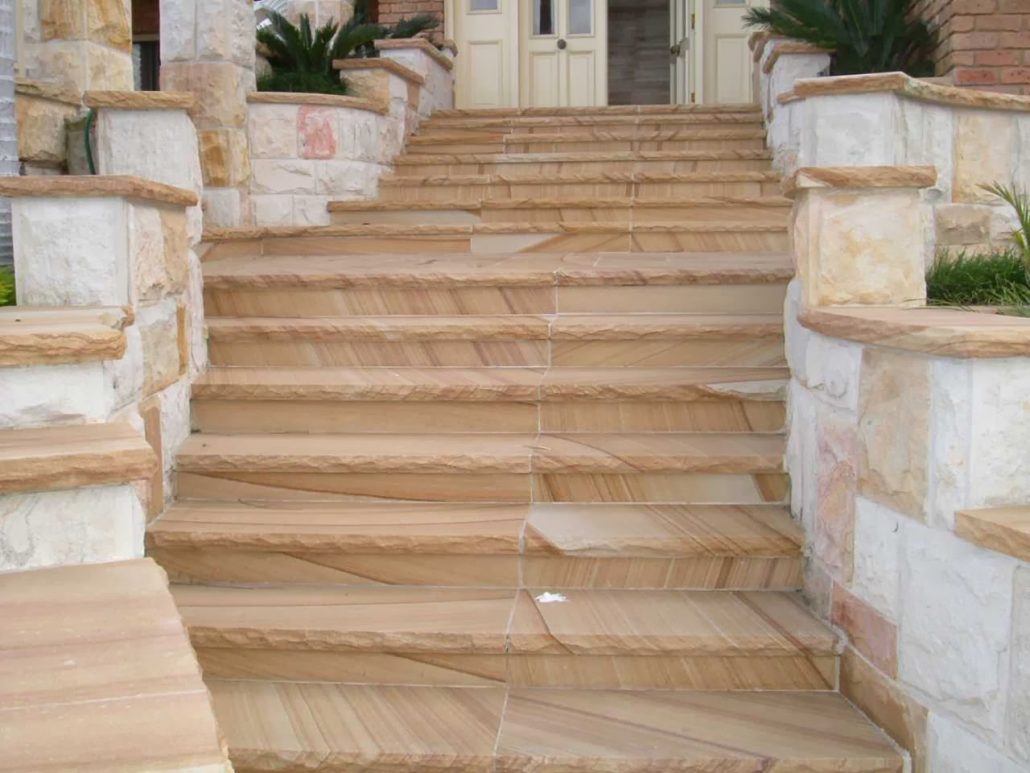 Wide sandstone steps with flanking walls